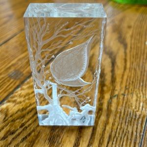 Vintage clear paperweight with carving.  Butterfly and plants.  4”x2”